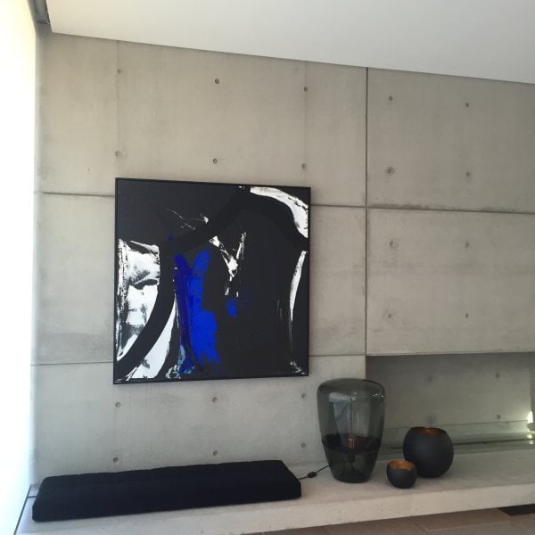 ArtiTeq Shadowline Masonry Concrete Wall Abstract artwork on off‑form concrete wall hung from hidden ArtiTeq Shadowline Masonry picture rail, fine shadow line