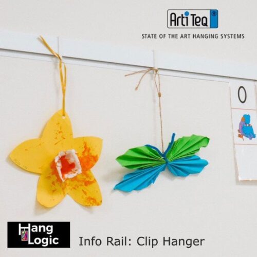 Image of ArtiTeq Info Rail with Clip Hangers holding lightweight craft projects, including a yellow flower and green butterfly, available at Hang Logic.