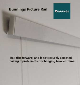 Close-up of a Bunnings picture rail tilting away from a wall, indicating insecure attachment."