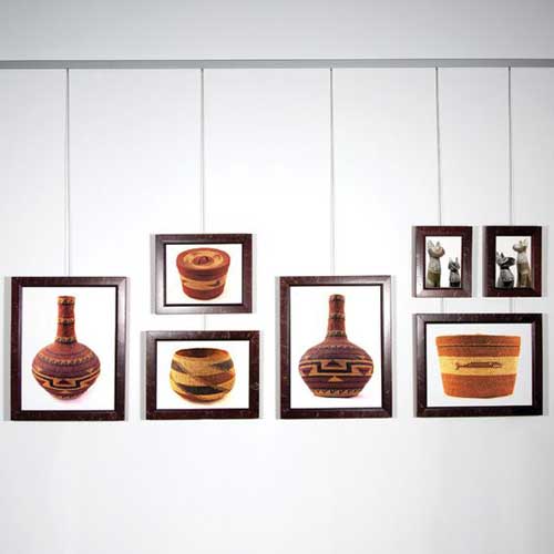 Six framed pottery artworks displayed using Hang Logic picture hanging system