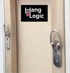 Close-up of two D-rings attached to the back of a picture frame