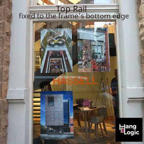 Artiteq top rail mounted to the underside of a window architrave at Hassell Architects, displaying their architectural projects, available at Hang Logic.