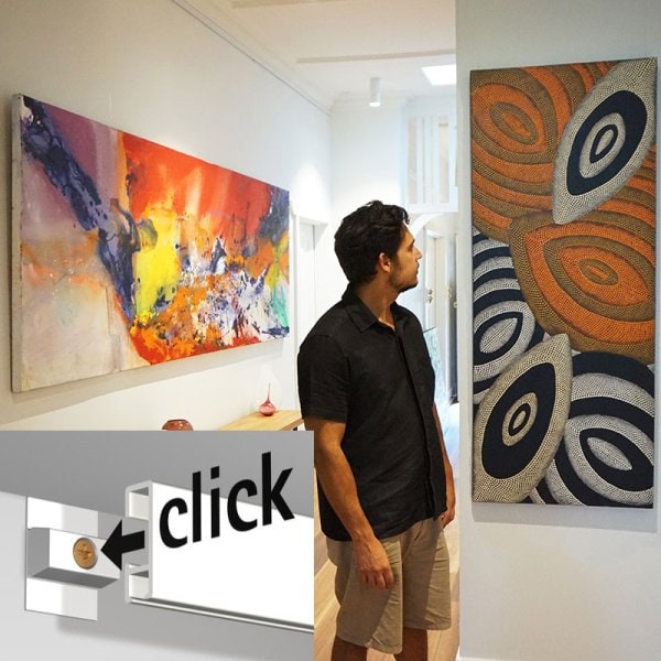 artiteq-click-rail-hanglogic Artiteq Click Rail picture-hanging system displaying an aboriginal artwork and a large colourful artwork.