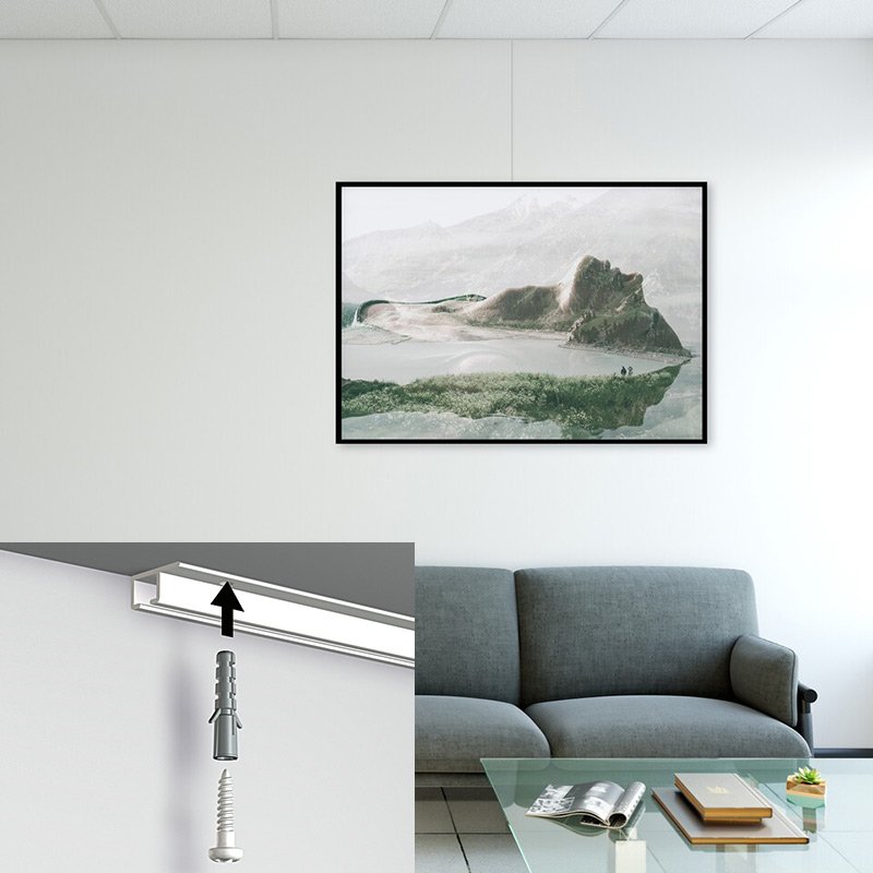 Artiteq Top Rail ceiling-mounted picture rail with a minimalist design, hanging a framed mysterious mountain artwork.