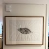 Framed ink drawing hung on wires from hidden ArtiTeq Shadowline Drywall picture rail in square set ceiling
